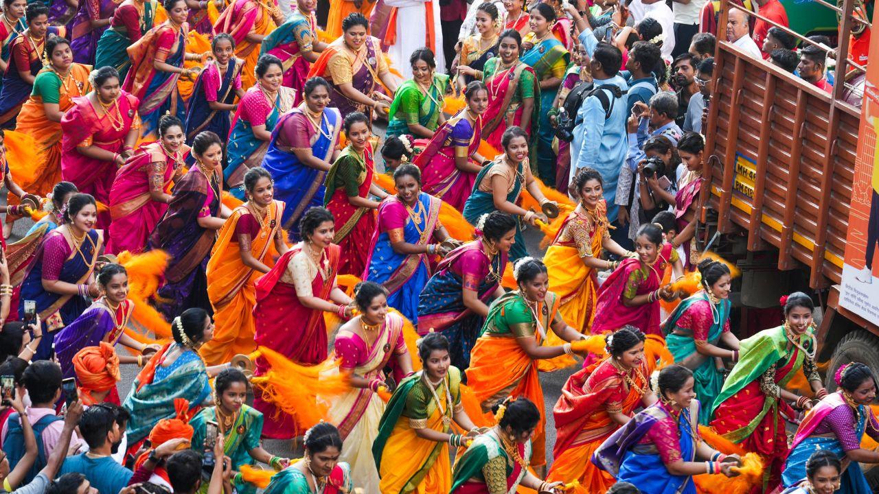 Women dressed in traditional attire gather in large numbers to participate in a rally and other cultural activities on the occasion of 'Gudi Padwa'. (PTI Photo/Kunal Patil)